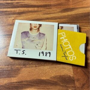 Taylor Swift CD with Yellow and White Cover